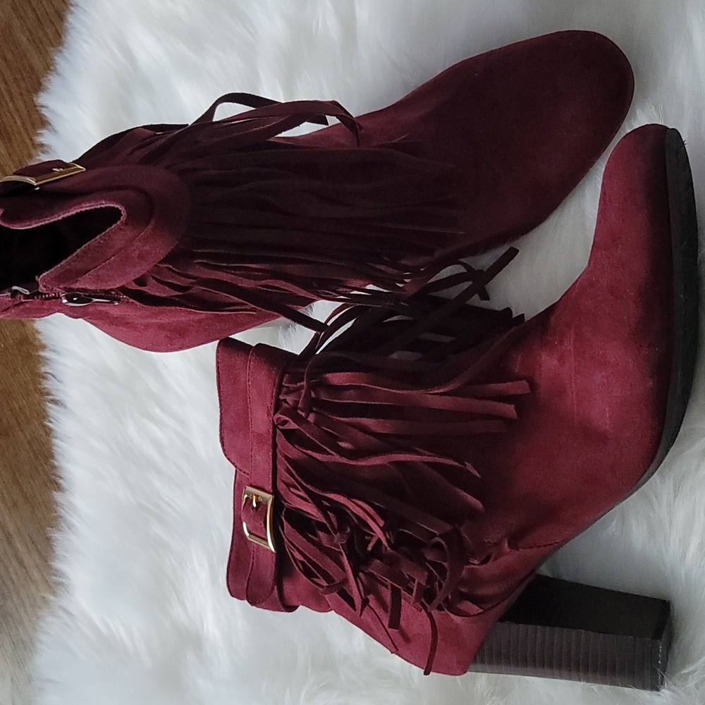 Burgundy fringe booties with gold buckle
